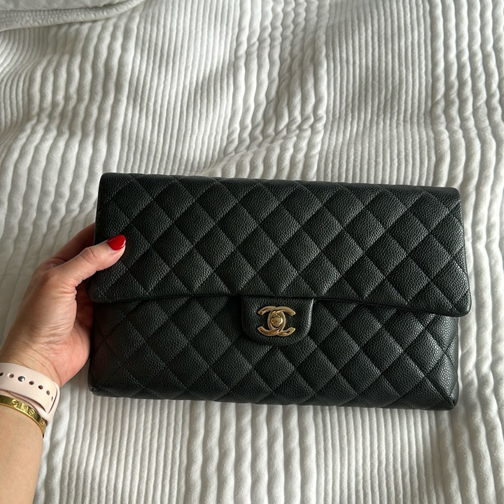 Black caviar Chanel clutch—cute and good condition